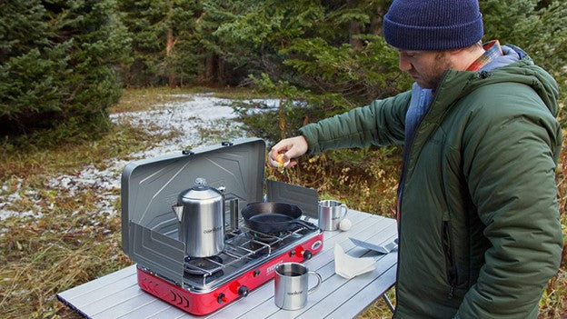 Camp Chef Aluminum Hot Water Pot with Dispenser in the Grill